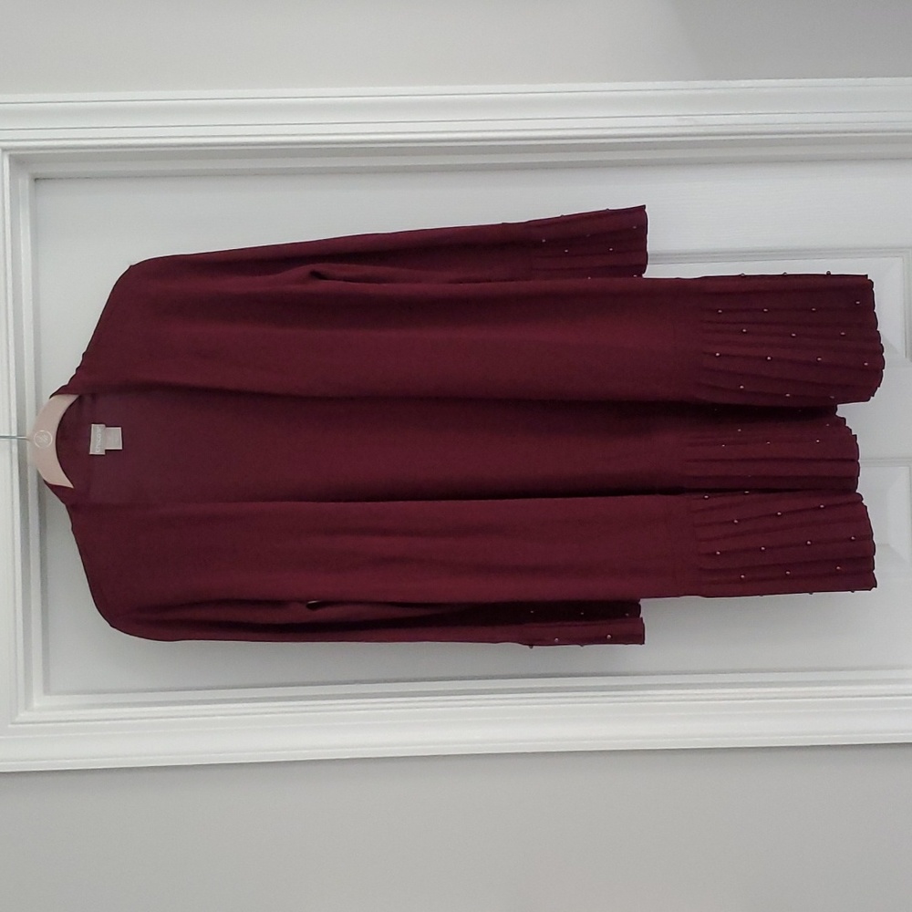Chicos size 0 long sleeve burgundy cardigan with beading.